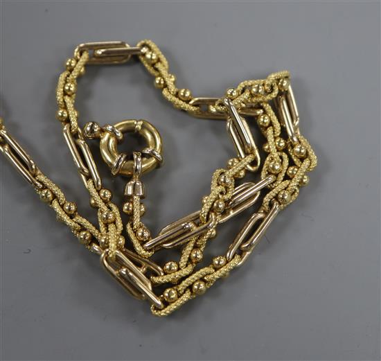 A yellow metal fancy long link chain, 23.8 grams.